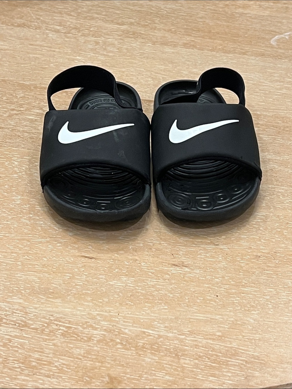 Nike Kids Black Slide Sandals with White Swoosh and Heel Strap